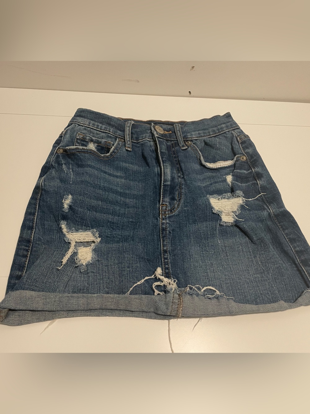 Aero Brand Junior's size 000 High Rise Medium Wash Denim Distressed Mini Skirt